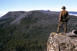 Man looking to Mount Marian from Mount Charles