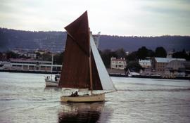 Dark sails on yacht