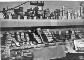 Display of Cadbury chocolate bars, assorted boxed chocolates and tinned items