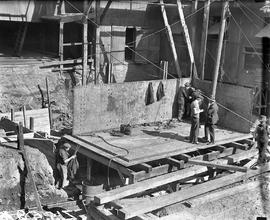 Workers assembling jacket of Derwent Prime furnace at E.Z. Co. Zinc Works