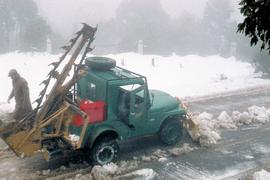 Snow plowing on road to Mount Wellington