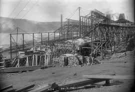 Timber trusses, bricks and framework of new building under construction at E.Z. Co. Zinc Works 1924