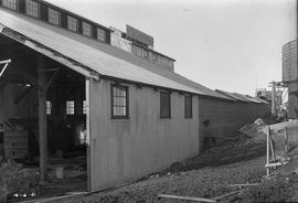 Bricks stacked inside corrugated iron shed at E.Z. Co. Zinc Works at Risdon
