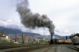 C Class locomotive pulls passenger cars at Hobart Station