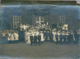 Photograph of large group in historic costumes