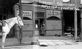 View of shop, B Bird Butcher with proprietor outside, Queenstown Tasmania