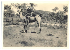 Photograph of Olive Pink and the the camel Quart-pot